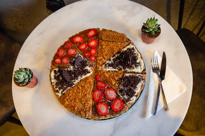 Nutella pizza dessert with powdered sugar at Via 313